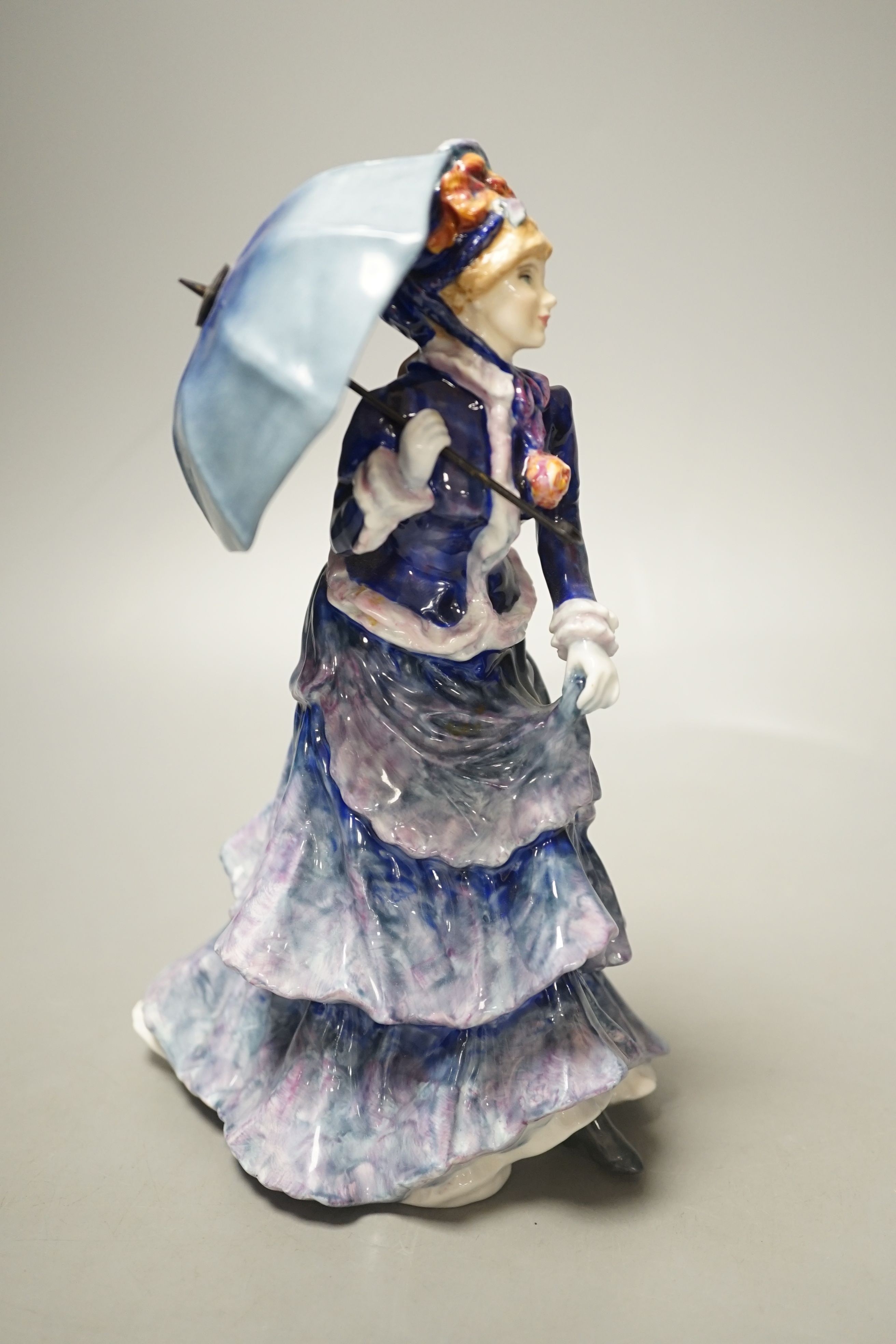 A Royal Doulton figure, Les Parapluies HN3473 - 20cm tall